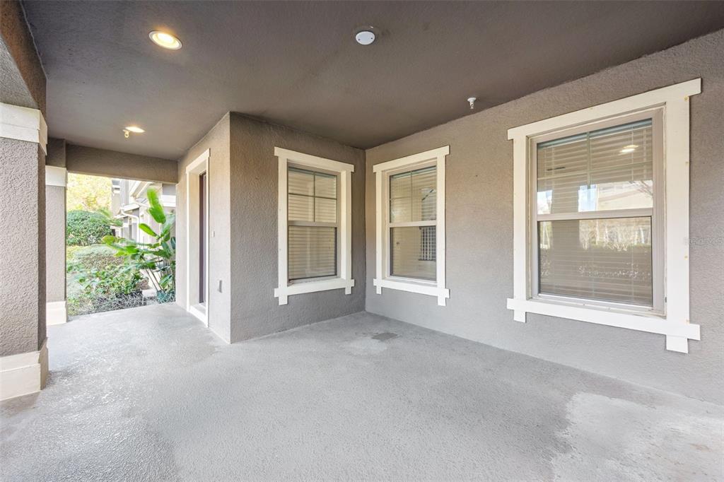 10866 Sunset Ridge Lane Orlando, FL 32832 - Photo 15 of 74 a view of an empty room with a window and balcony view