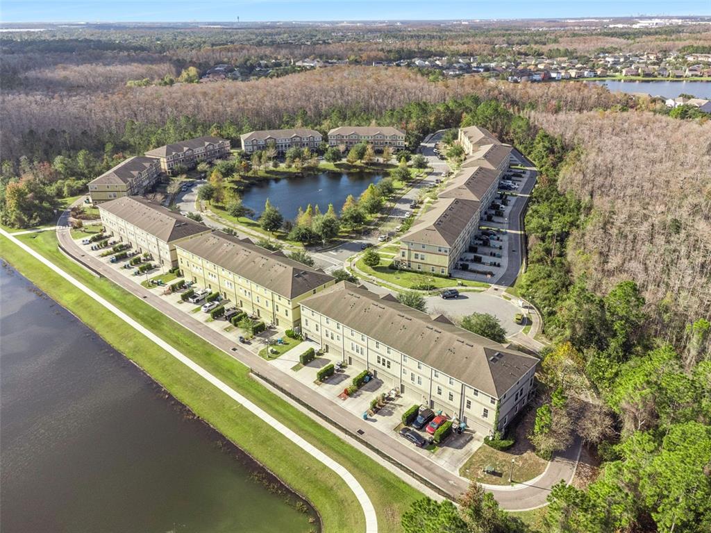 10866 Sunset Ridge Lane Orlando, FL 32832 - Photo 45 of 74 an aerial view of a residential houses with outdoor space