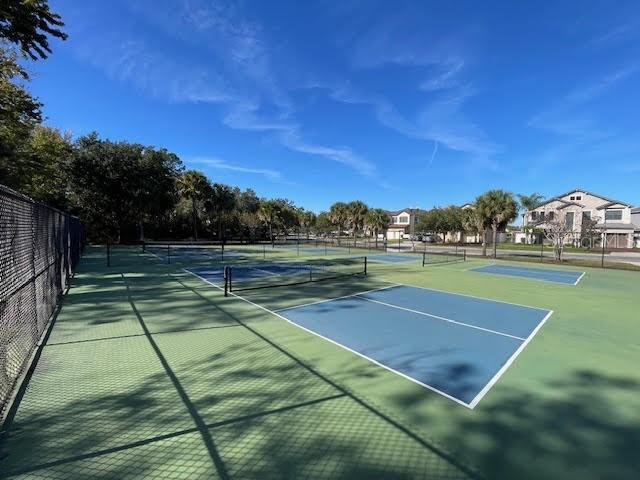 10866 Sunset Ridge Lane Orlando, FL 32832 - Photo 72 of 74 a view of a tennis court