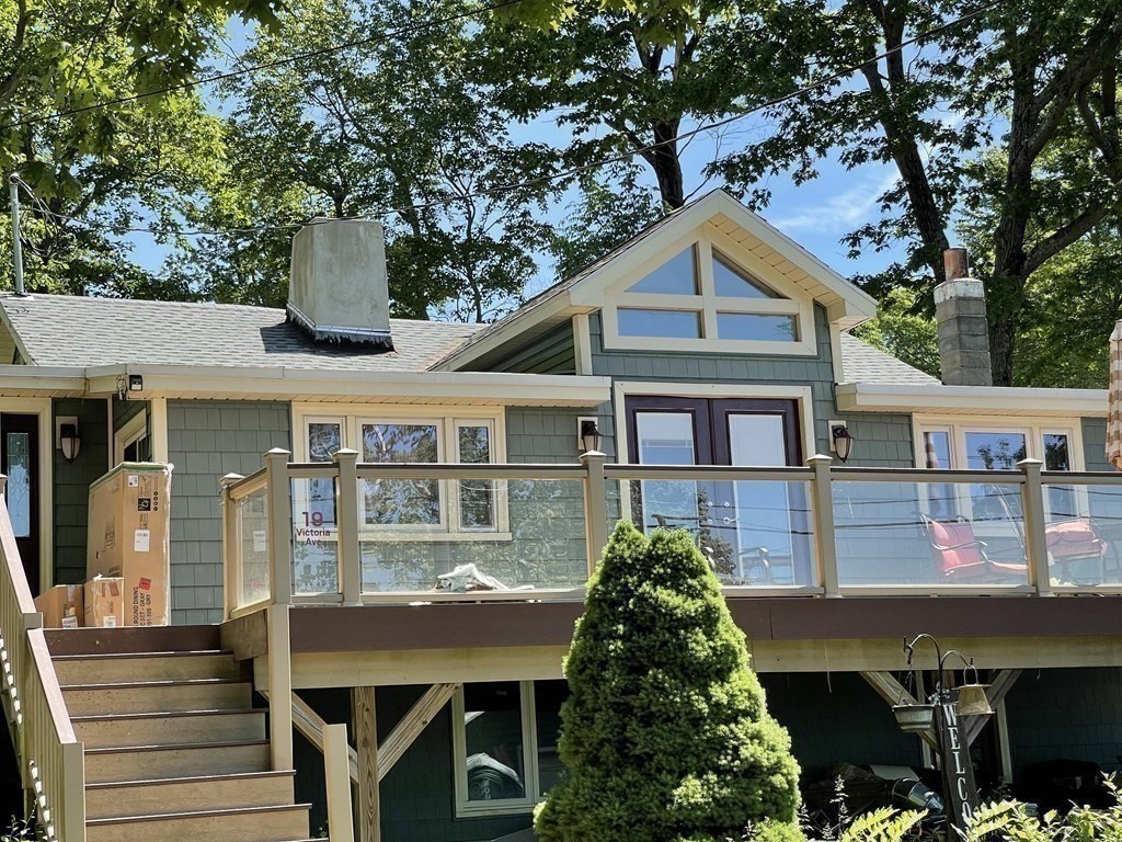 19 Victoria Avenue Rutland, MA 01543 - Photo 5 of 21 a front view of a house with a yard garage and outdoor seating