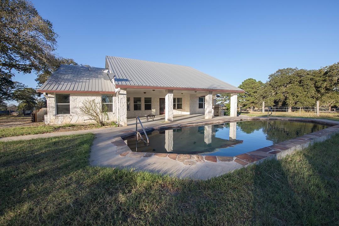 1111 Pine Ranch Road Seguin, TX 78155 - Photo 17 of 50 Rear View of main house and pool