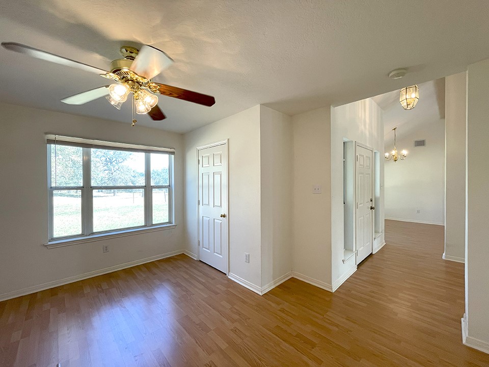 1111 Pine Ranch Road Seguin, TX 78155 - Photo 20 of 50 View of extra room on left, foyer, dining room on right.