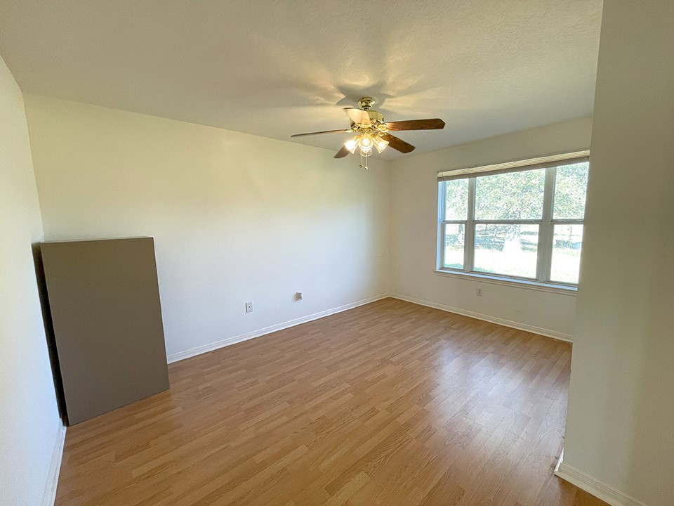 1111 Pine Ranch Road Seguin, TX 78155 - Photo 30 of 50 Secondary bedroom has laminate flooring.