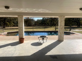 1111 Pine Ranch Road Seguin, TX 78155 - Photo 32 of 50 Pool and view from outdoor living area