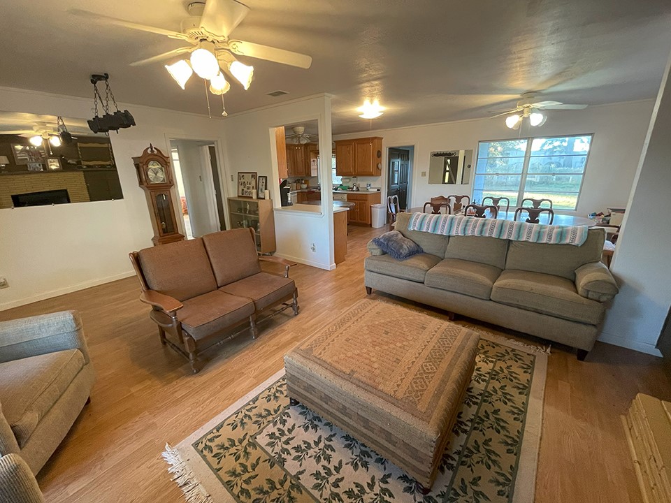 1111 Pine Ranch Road Seguin, TX 78155 - Photo 36 of 50 Guest house living room, dining room, kitchen. Laundry room is behind kitchen. Hall goes to 3 bedroom and 1 bath. 19'x13'