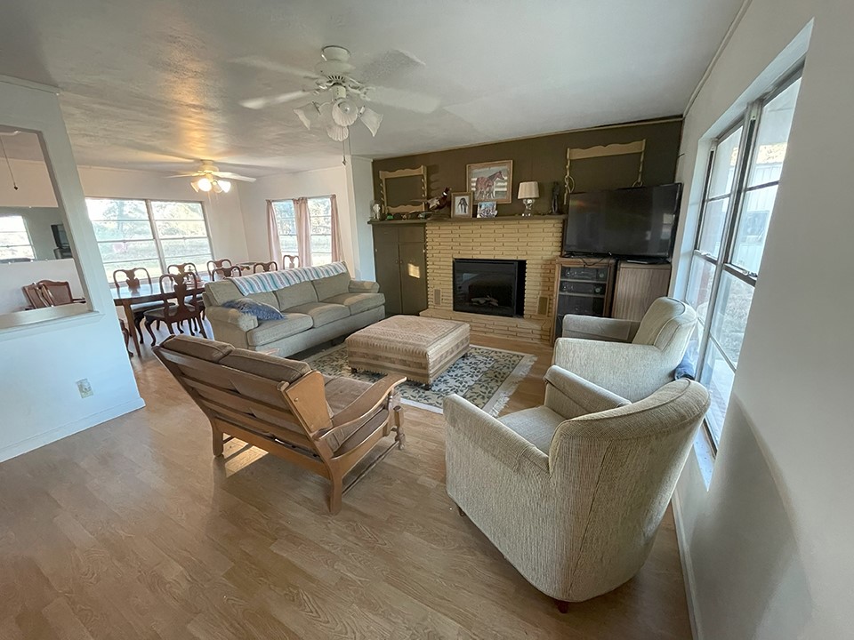 1111 Pine Ranch Road Seguin, TX 78155 - Photo 37 of 50 Guest house living room has fireplace. 19'x13'. Dining room is 12'x11'