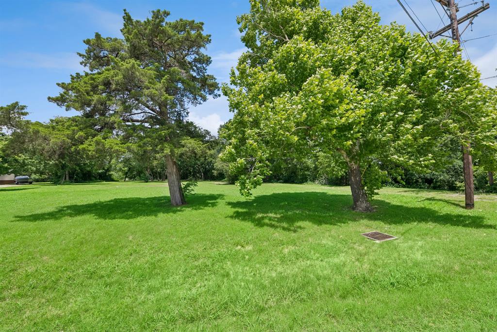 286 West Forest Grove Road Lucas, TX 75002 - Photo 22 of 23 a view of green field with trees in the background