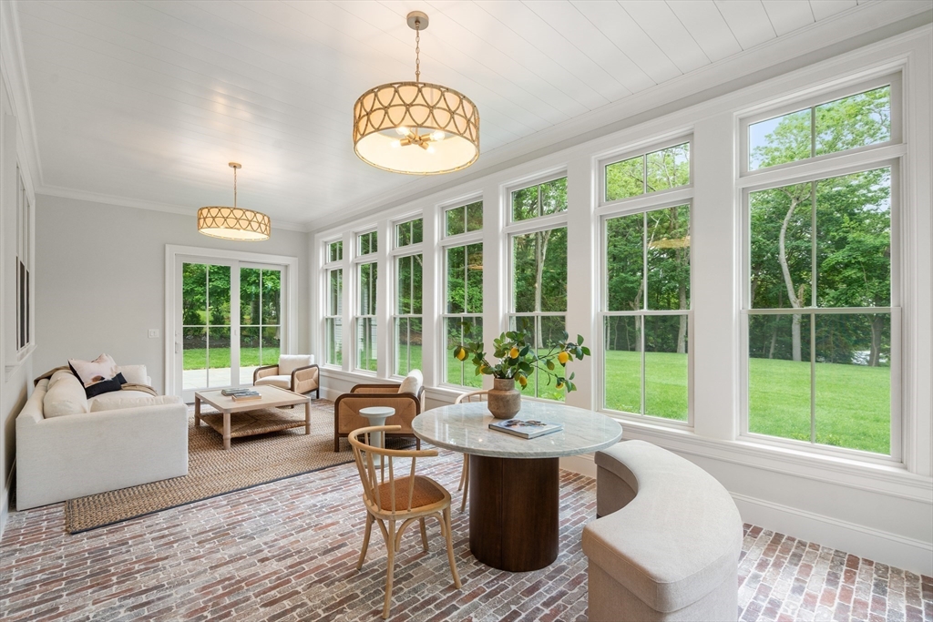15 Lathrop Road Wellesley, MA 02482 - Photo 13 of 40 a view of a dining room with furniture window and outside view