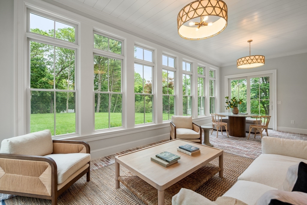 15 Lathrop Road Wellesley, MA 02482 - Photo 15 of 40 a living room with furniture and a large window