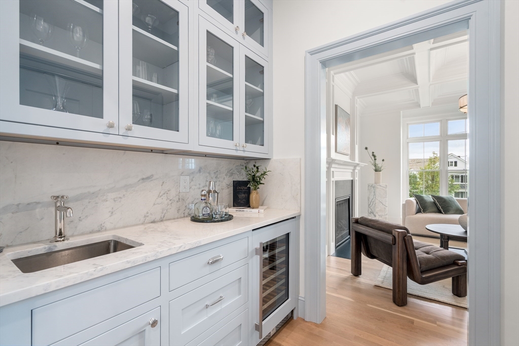 15 Lathrop Road Wellesley, MA 02482 - Photo 18 of 40 a kitchen with a sink and cabinets