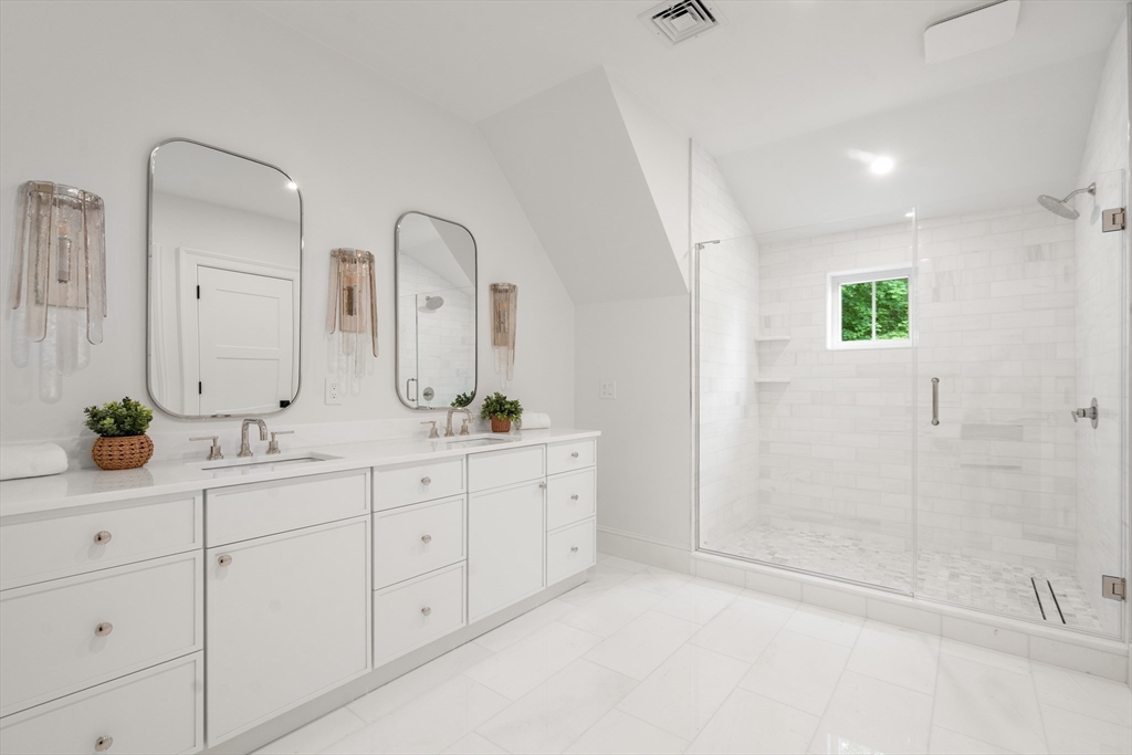 15 Lathrop Road Wellesley, MA 02482 - Photo 30 of 40 a spacious bathroom with double sink and a mirror