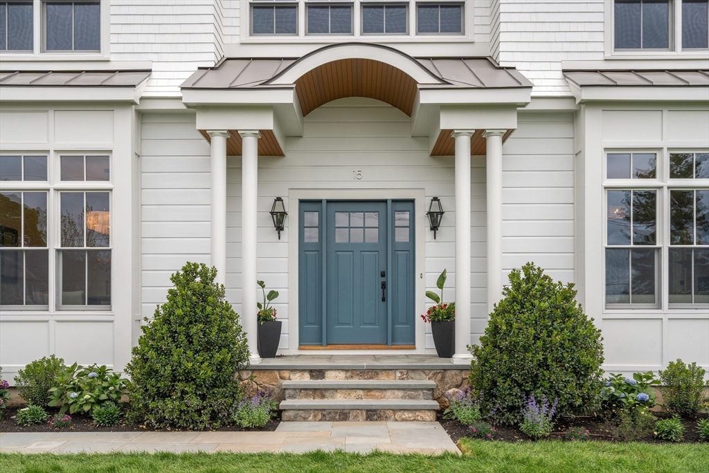 15 Lathrop Road Wellesley, MA 02482 - Photo 3 of 40 a front view of a house with garden