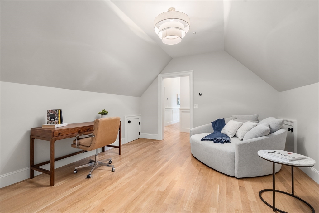 15 Lathrop Road Wellesley, MA 02482 - Photo 31 of 40 a living room with furniture and a wooden floor