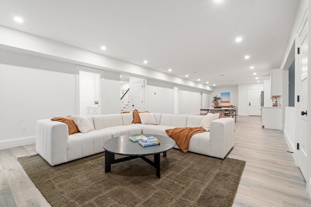 15 Lathrop Road Wellesley, MA 02482 - Photo 35 of 40 a living room with furniture and view of kitchen