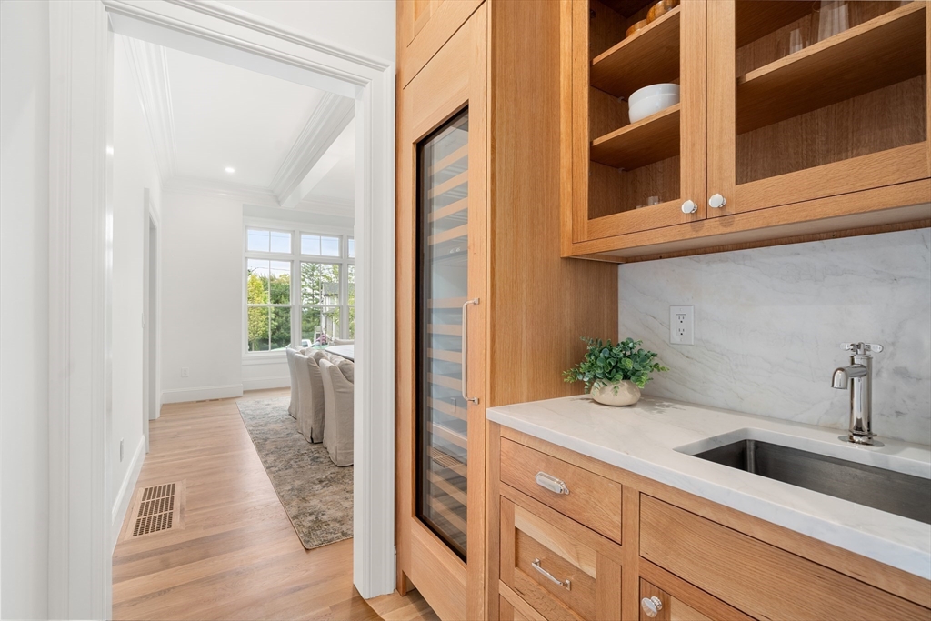 15 Lathrop Road Wellesley, MA 02482 - Photo 6 of 40 a bathroom with a sink and a mirror