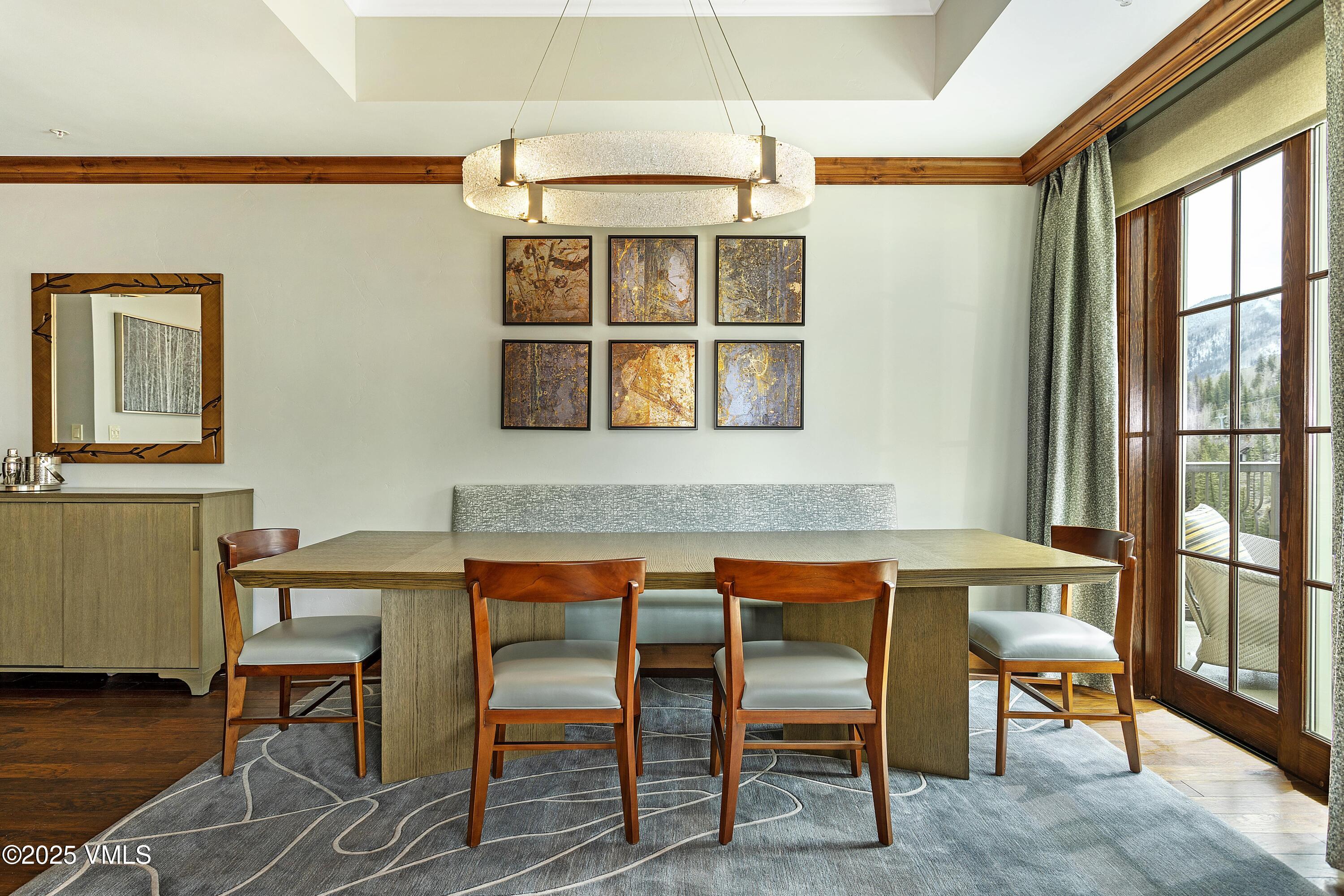 728 West Lionshead Circle, Unit F429 Vail, CO 81657 - Photo 25 of 25 a dining room with furniture and window