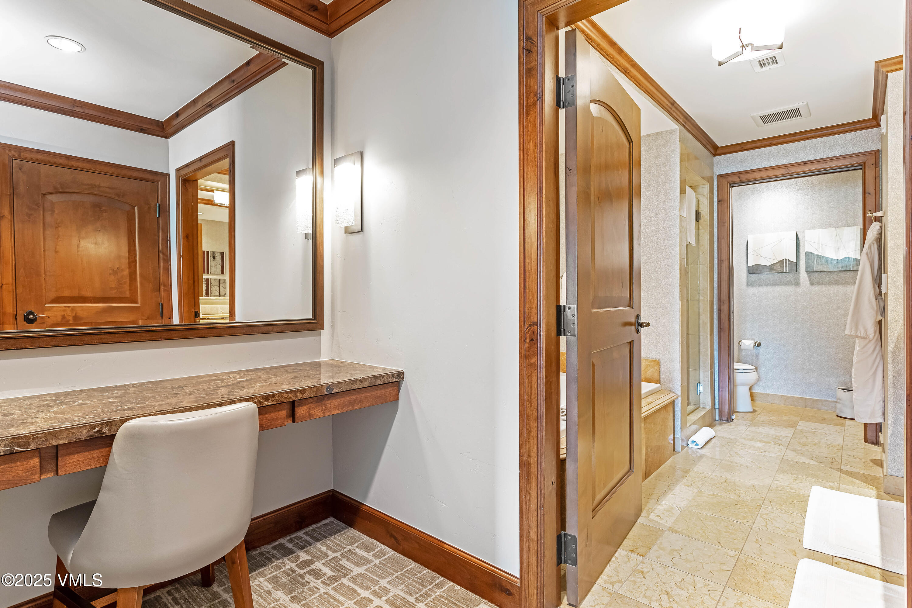 728 West Lionshead Circle, Unit F429 Vail, CO 81657 - Photo 6 of 25 a view of a hallway with furniture and front door