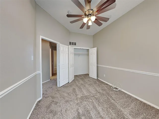 an empty room with closet