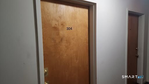 115 Short Beach Road, Unit 304 Stratford, CT 06615 - Photo 17 of 26 a bathroom with a shower