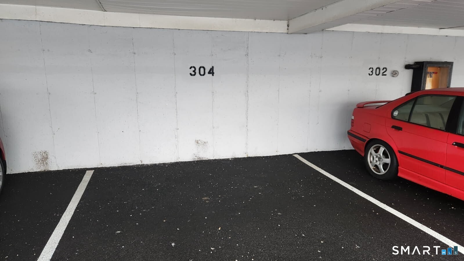 115 Short Beach Road, Unit 304 Stratford, CT 06615 - Photo 24 of 26 a view of car garage