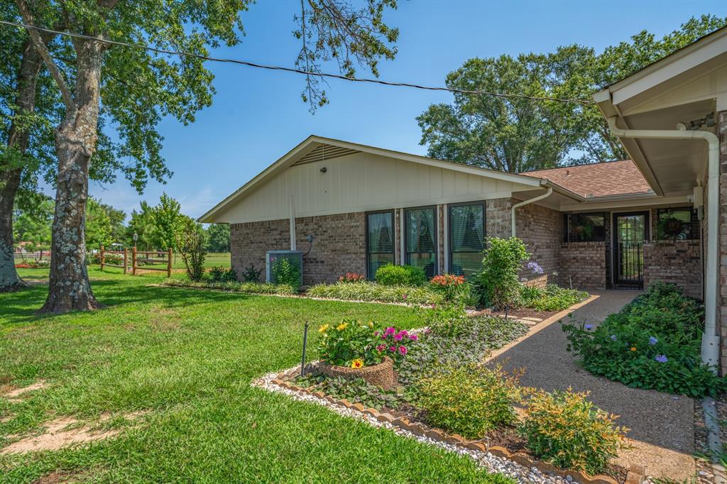776 County Road 3209 Wills Point, TX 75169 - Photo 11 of 40 a front view of a house with a yard