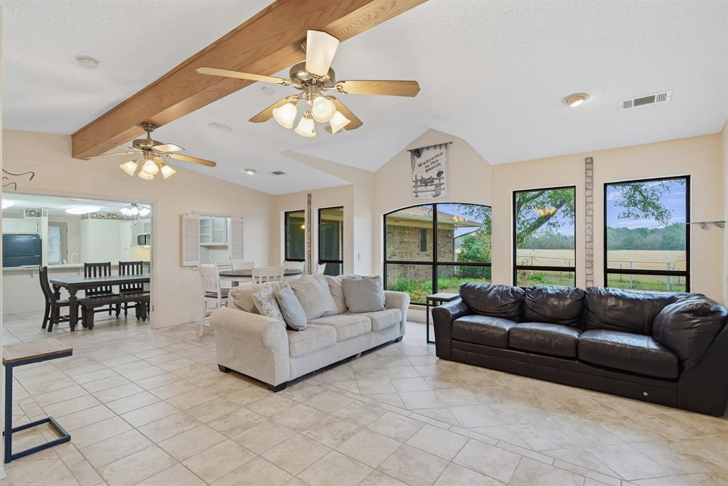 776 County Road 3209 Wills Point, TX 75169 - Photo 20 of 40 a living room with furniture and large windows