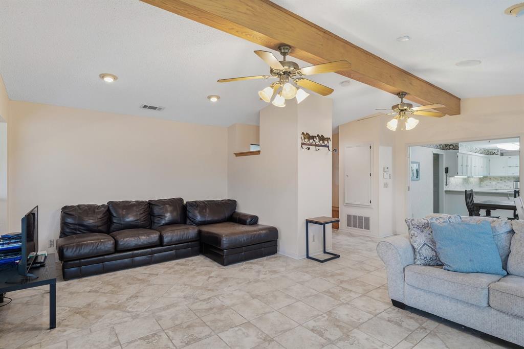 776 County Road 3209 Wills Point, TX 75169 - Photo 23 of 40 a living room with furniture and kitchen view