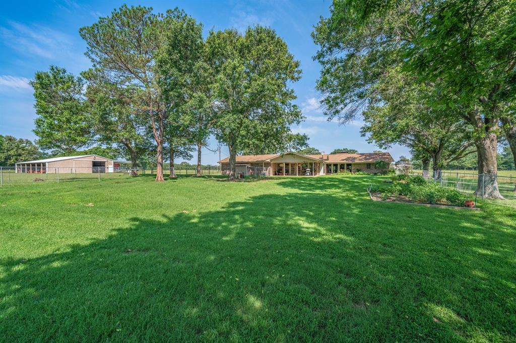 776 County Road 3209 Wills Point, TX 75169 - Photo 36 of 40 a house view with swimming pool in front of it