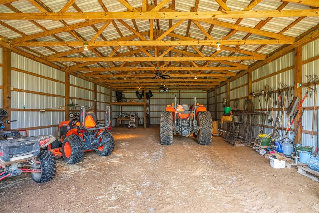 776 County Road 3209 Wills Point, TX 75169 - Photo 6 of 40 a view of a storage room with gym equipment