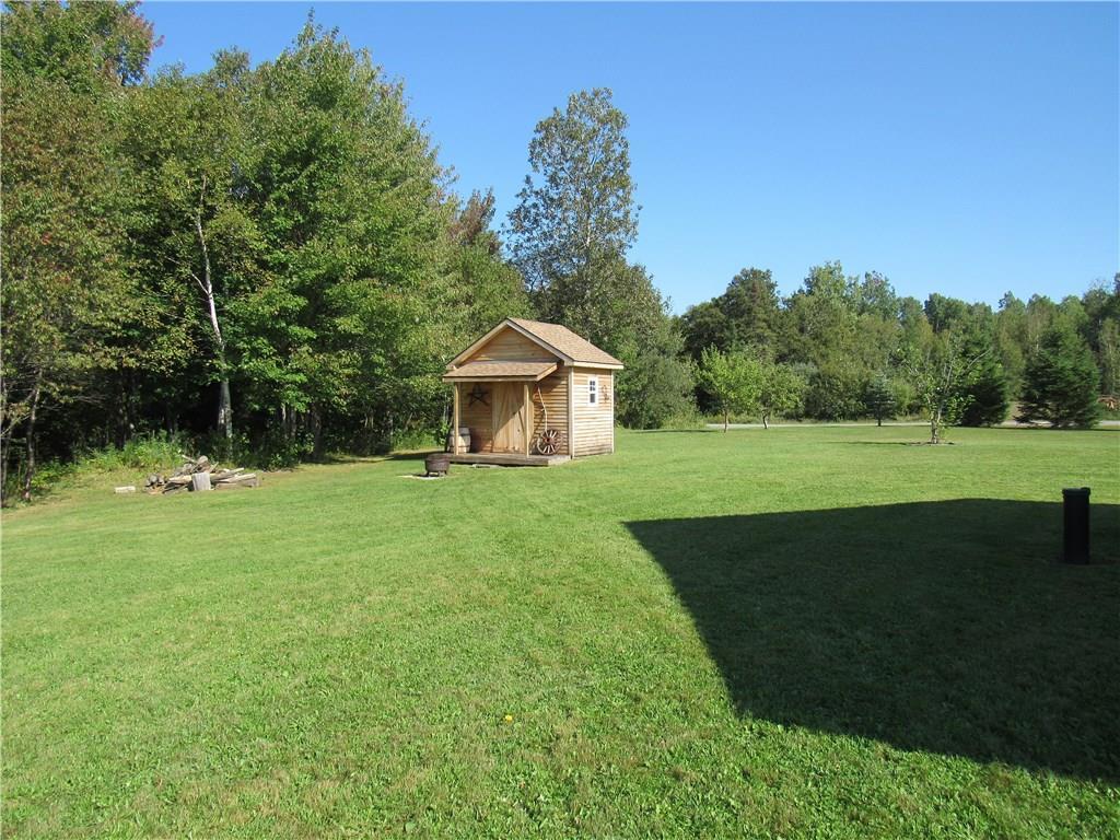 12 Halfway Brook Road Jackman, ME 04945 - Photo 4 of 21 Nice back yard with utility shed.
