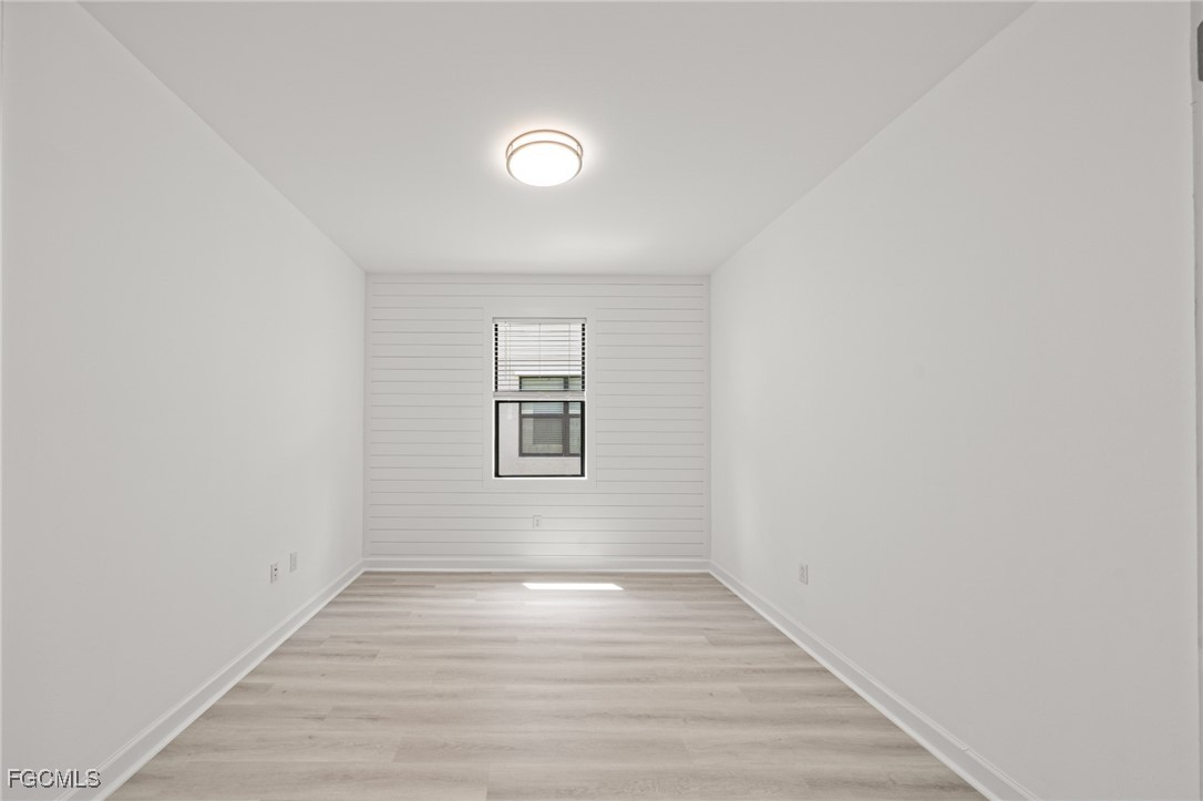 11559 Canopy Loop Fort Myers, FL 33913 - Photo 25 of 50 a view of a room with wooden floor and window