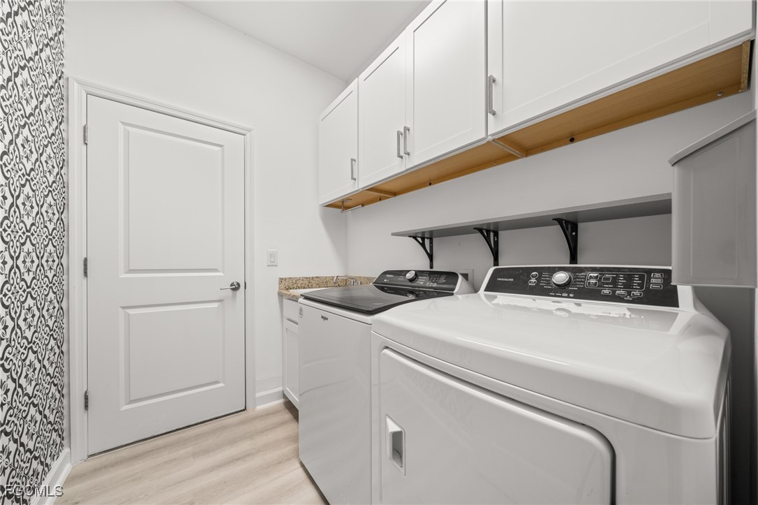 11559 Canopy Loop Fort Myers, FL 33913 - Photo 33 of 50 a utility room with dryer and washer