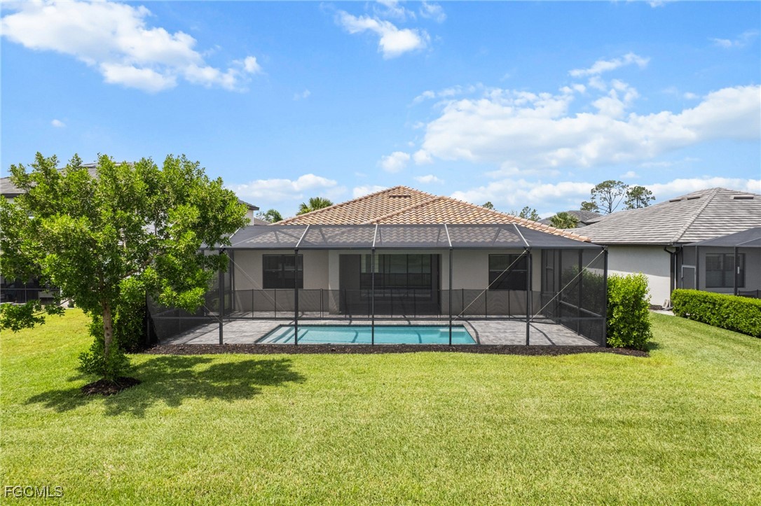 11559 Canopy Loop Fort Myers, FL 33913 - Photo 41 of 50 a view of a house with a yard