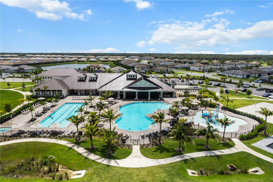 11559 Canopy Loop Fort Myers, FL 33913 - Photo 44 of 50 an aerial view of residential houses with outdoor space and ocean view
