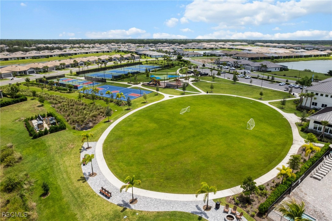 11559 Canopy Loop Fort Myers, FL 33913 - Photo 48 of 50 an aerial view of a swimming pool with outdoor seating and yard