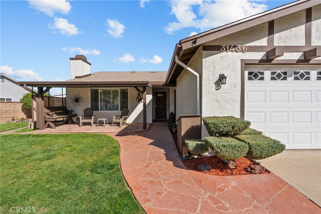 31436 Arrow Point Drive Castaic, CA 91384 - Photo 11 of 76 a view of a porch with furniture