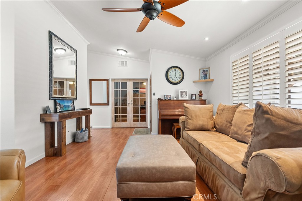 31436 Arrow Point Drive Castaic, CA 91384 - Photo 20 of 76 a living room with a bed furniture and a large window