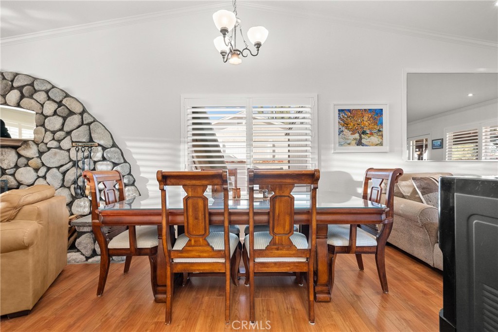 31436 Arrow Point Drive Castaic, CA 91384 - Photo 22 of 76 a dining room with furniture and wooden floor