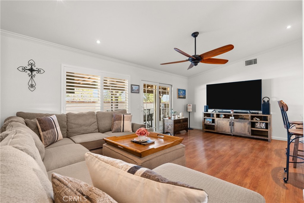 31436 Arrow Point Drive Castaic, CA 91384 - Photo 29 of 76 a living room with furniture and a flat screen tv