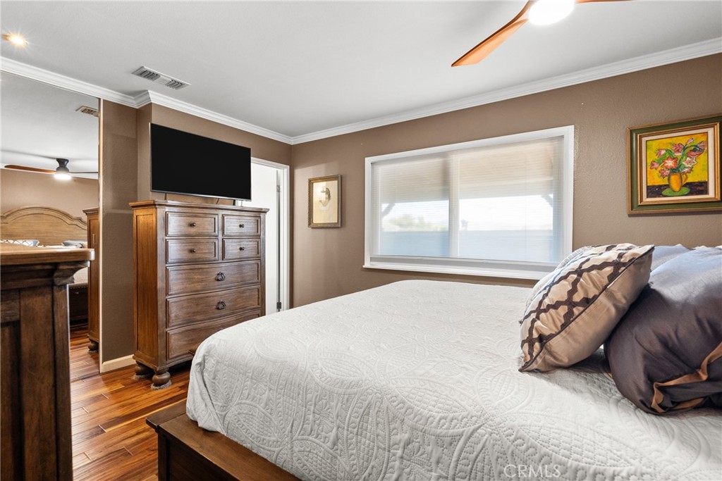 31436 Arrow Point Drive Castaic, CA 91384 - Photo 44 of 76 a bedroom with a bed and a television