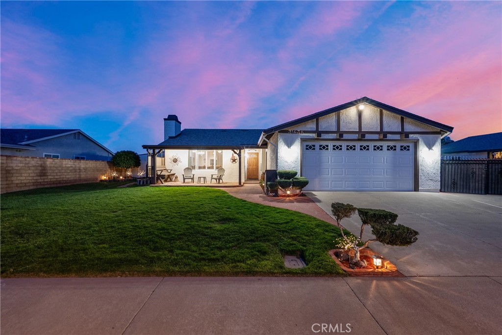 31436 Arrow Point Drive Castaic, CA 91384 - Photo 4 of 76 a front view of a house with a garden