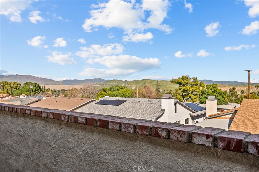 31436 Arrow Point Drive Castaic, CA 91384 - Photo 58 of 76 a view of a terrace with outdoor seating and a lake view