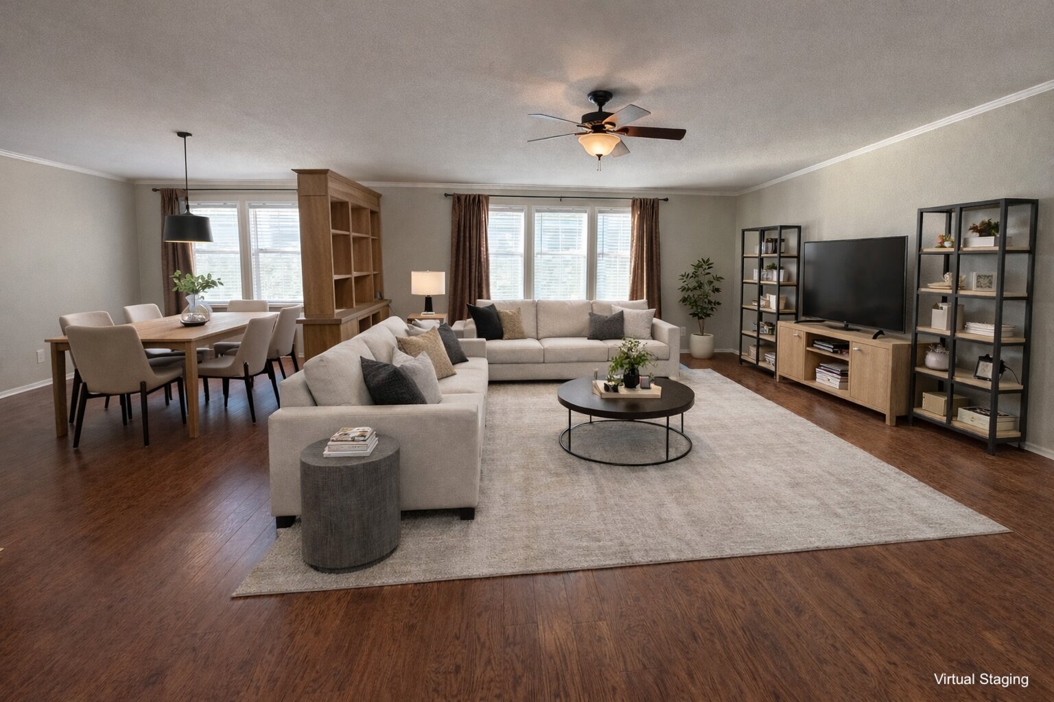 a living room with furniture and a flat screen tv