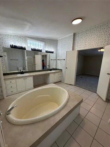 a white bath tub sitting in a kitchen