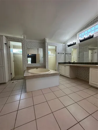 a white bath tub sitting in a kitchen