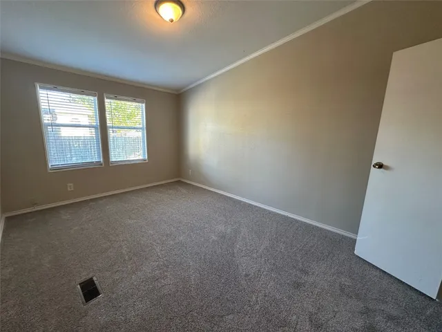 a front view of a house with a wooden floor