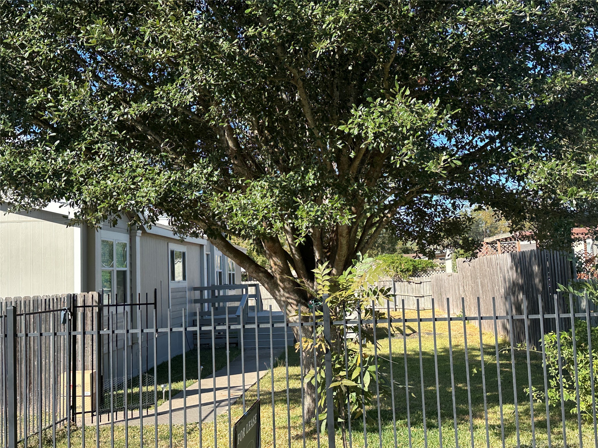 104 Ramirez Street Kyle, TX 78640 - Photo 29 of 31 a view of a wrought iron fences in front of house