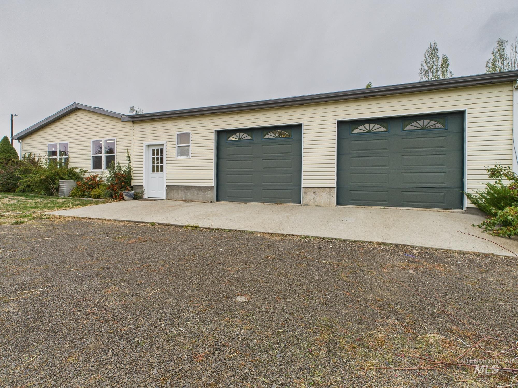 523 3rd Street Ferdinand, ID 83526 - Photo 2 of 41 Ranch-style house featuring a garage