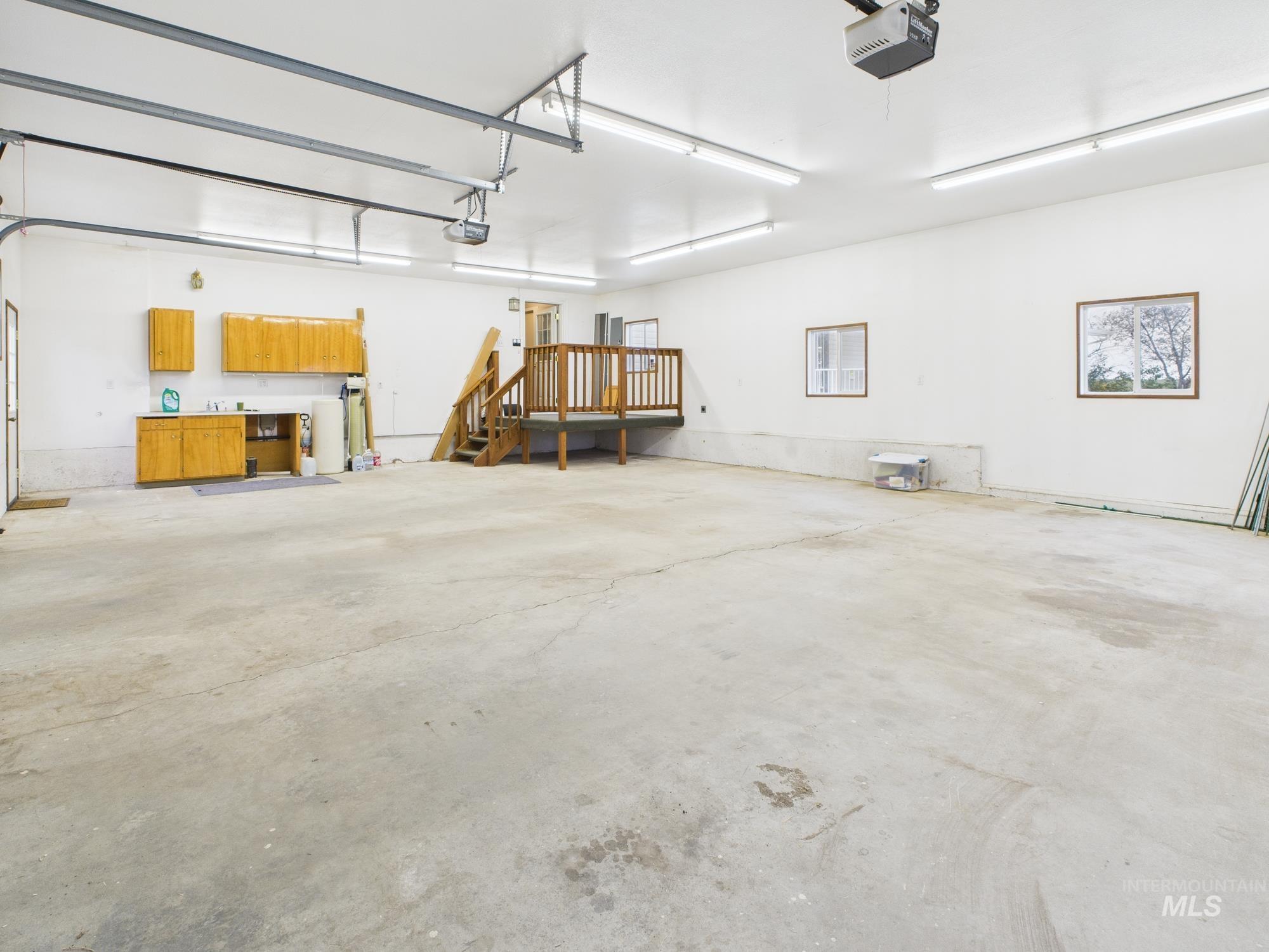 523 3rd Street Ferdinand, ID 83526 - Photo 25 of 41 Garage with a garage door opener