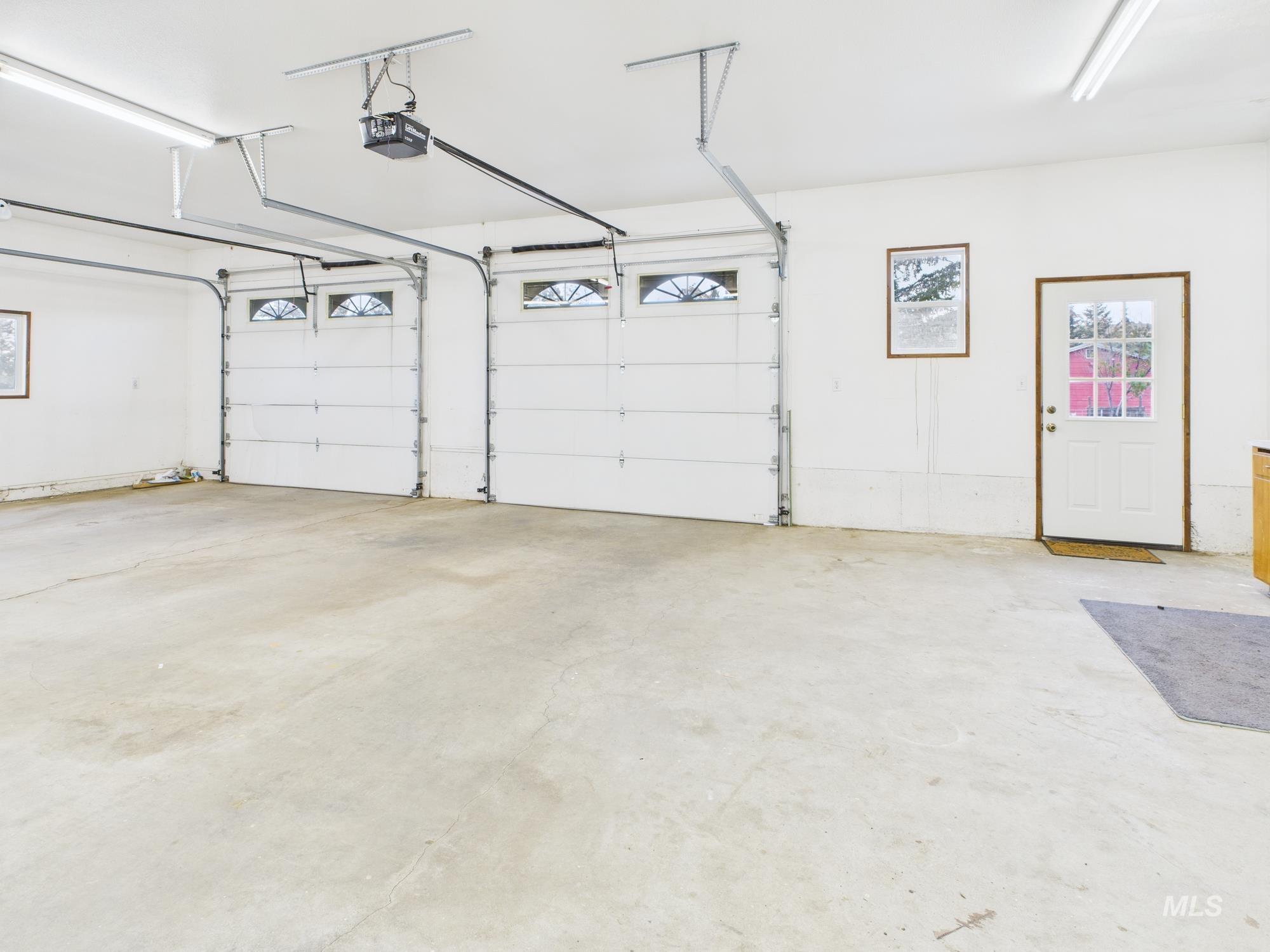 523 3rd Street Ferdinand, ID 83526 - Photo 27 of 41 Garage with a garage door opener